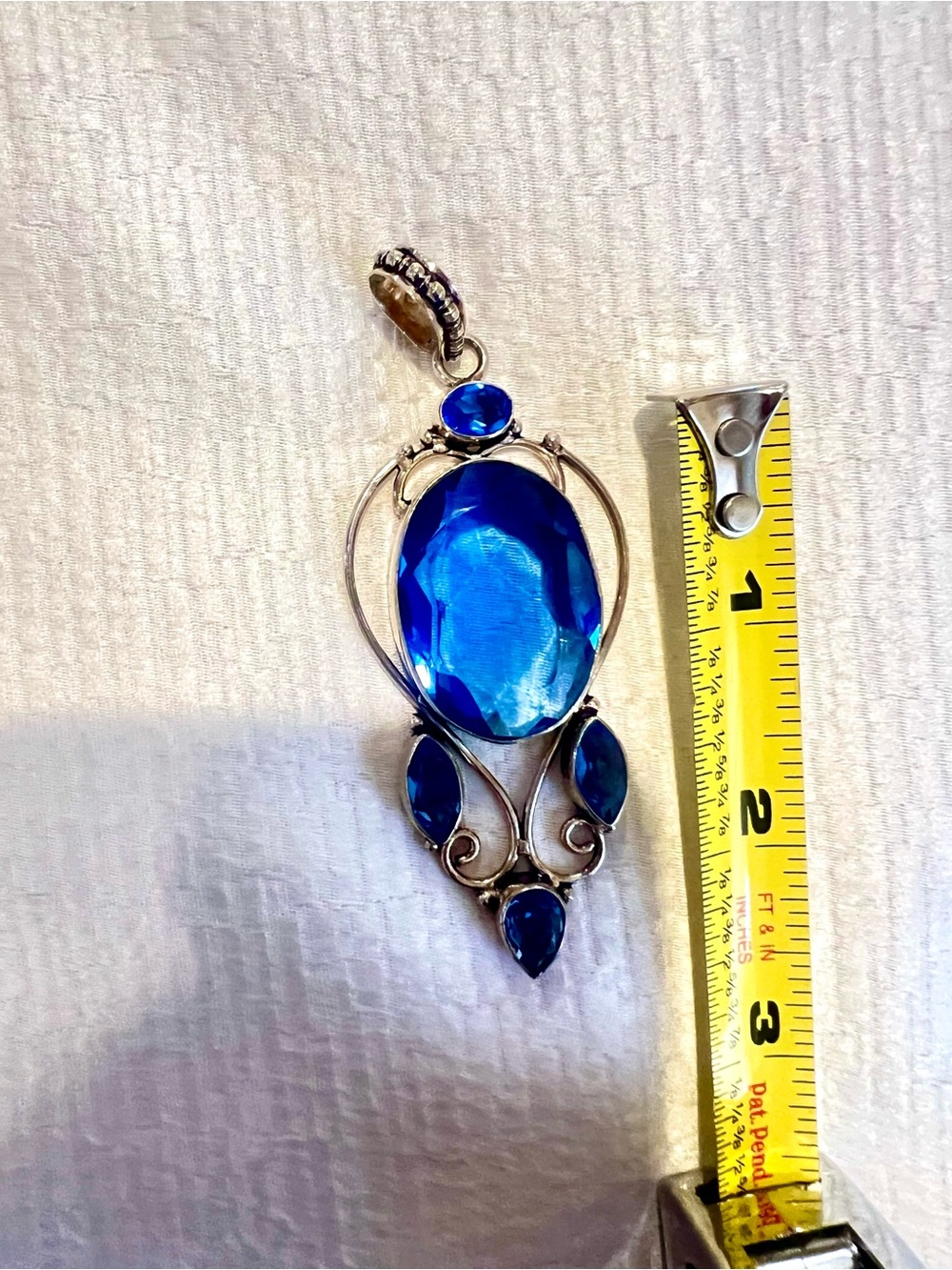 Sterling Silver Pendant with Deep Blue Oval Stone